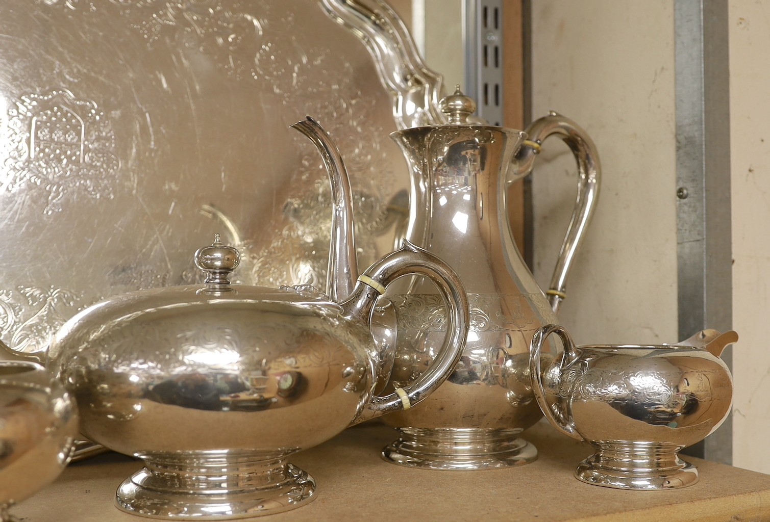 A 20th century Canadian Birks sterling seven piece tea and coffee service, comprising a tea tray, kettle on stand with burner, teapot, coffee pot, two sugar bowls and a cream jug, tea tray 64.7cm over handles